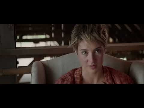 Trailer close-up: Tris under scanners in Erudite’s chamber; choral pads bloom over cold synths