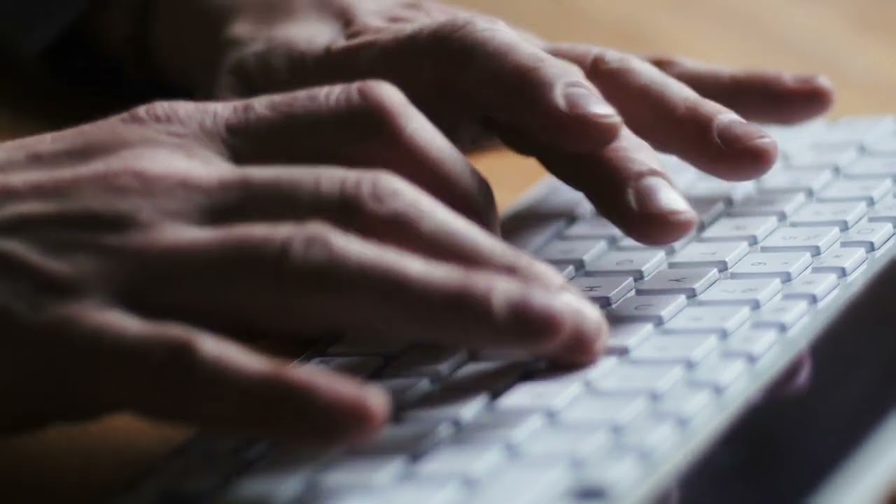 Close Up Of Hands Typing On A Computer Keyboard 4k Video | By Creator Stockify