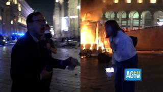 La lite tra una ragazza e il funzionario di polizia durante gli scontri a Milano: «Siete solo van...