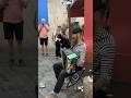Melodies of Montmartre: Accordion Maestro and His Feline Muse 🎵🐱 Parisian Street Musician