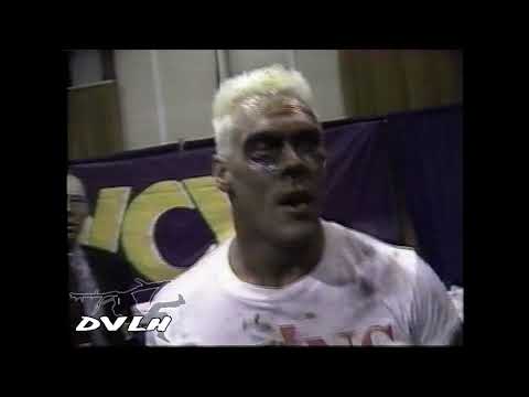 Rick Rude goes in-on Sting after he wins the WCW title.