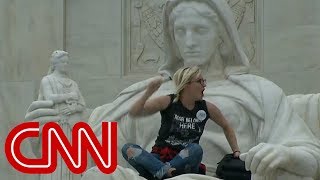 Anti-Kavanaugh protesters bang on the doors of the Supreme Court