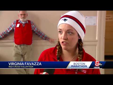 Boston Marathon runners brave rain, cold weather