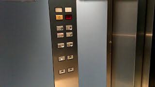 Download the video "Fast Schindler elevators - Parking P2 at La Cité Internationale - Lyon, France"