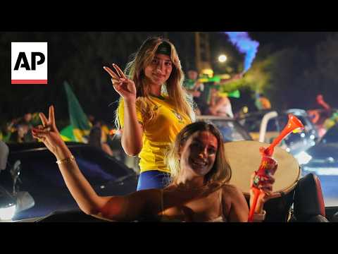 Thousands of people in Lebanon celebrate Brazil's victory over Japan