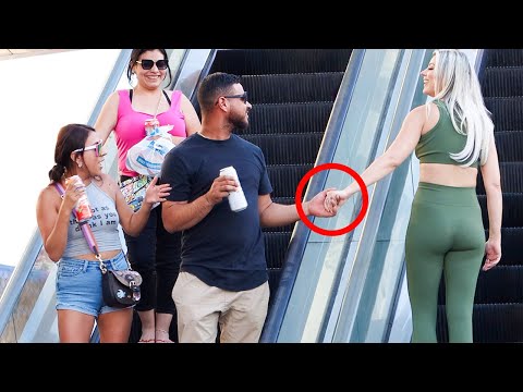 TOUCHING HANDS ON THE ESCALATOR 19!!