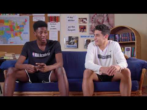 How many languages are spoken at the NBA Academy Africa??