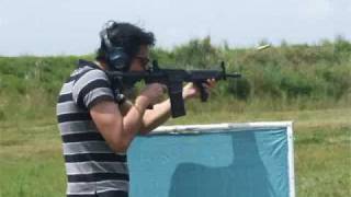 preview picture of video 'Marc firing a short M-16A1 custom build in Full Auto'
