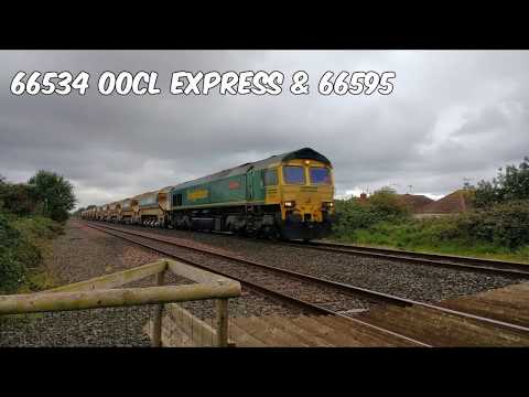 Prestatyn 17.9.2017 - Freightliner 66534 OOCL Express & 66595 with auto ballasters