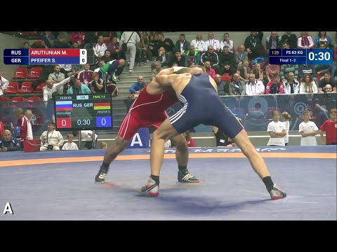 GOLD FS - 63 kg: M. ARUTIUNIAN (RUS) df. S. PFEIFER (GER), 2-2
