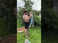 bodybuilder plays with a kid