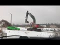 A real man crushed the car with an excavator. คนจริงบดรถด้วยรถขุด A real man crushed the car with an excavator. คนจริงบดรถด้วยรถขุด