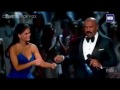 Pia Wurtzbach Gives Steve Harvey A Pair Of Eyeglasses Before Announcing The Final Result