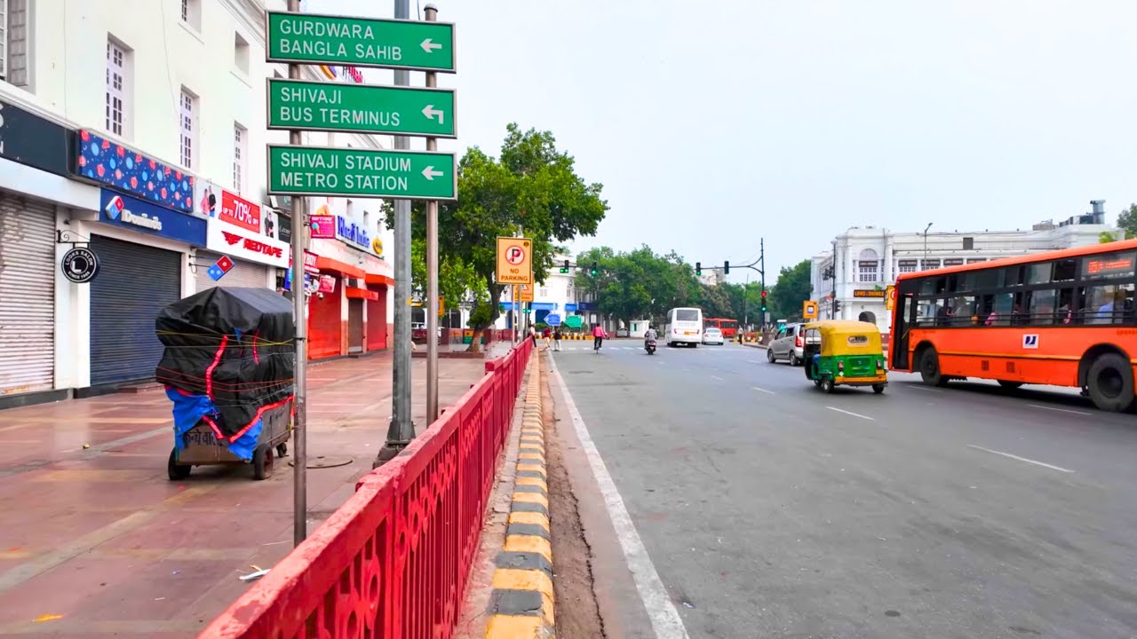 Immersive street-level walking tour through New Delhi   - Connaught Place Early Morning, India, showcasing authentic urban landscapes, local architecture, and the vibrant atmosphere of the city's neighborhoods