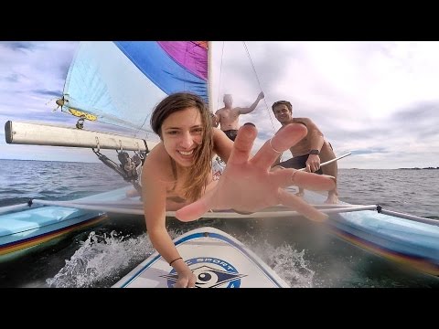 SURFING BEHIND A SAILBOAT