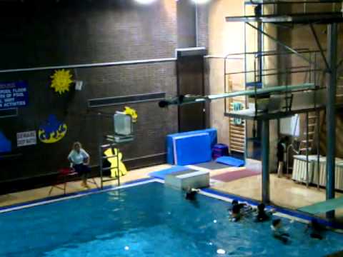 eliana learning to fold herself round a 3m diving board