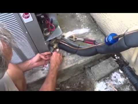 Part of a video titled How To Release Refrigerant into New System - YouTube