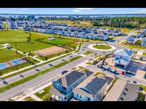Stunning 2 floors 4/3 Water View Home x Rent is located close to Lake Nona Medical City, Theme Parks, International Airport, Cocoa Beach, and Melbourne Beach. property video