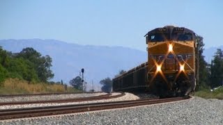 preview picture of video 'UP 7374 leads the Rock Train Westbound at Banning, California 8-31-2011'
