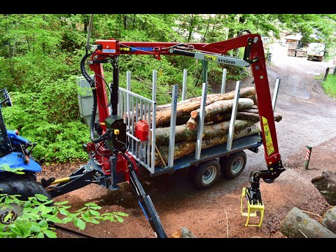 Hydraulische Seilwinde KTS auf Forstkran Tajfun DOT50K - Verricello idraulico su gru forestale