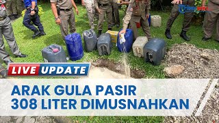 Detik-detik Pemusnahan 308 Liter Arak Gula Pasir Hasil Sitaan di Kantor Satpol PP Bali