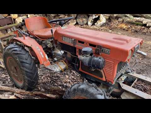 Kubota B7100, sierra circular y cortadora de madera de pértiga