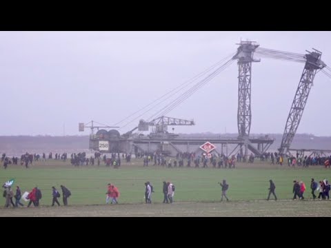 German protesters clash with police over coal mine expansion