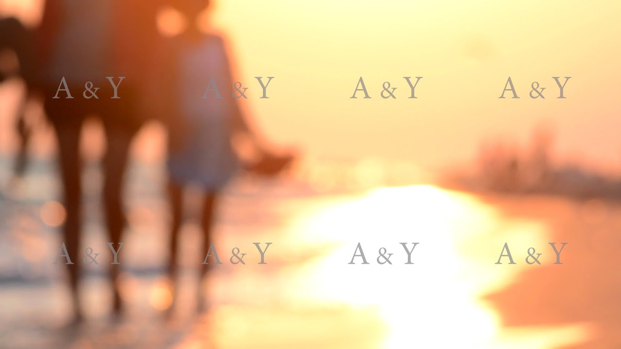 Happy family - father, mother and daughter having fun outdoors. Joyful young family with a beautiful