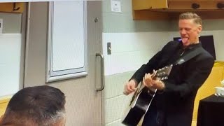 Bryan Adams playing the KISS song War Machine with Russell Peters