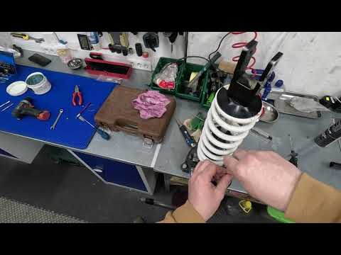 Inserting the inflation nipple into the SZC Lite shock absorber
