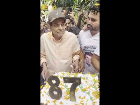 Dharam ji cake cutting with fans on his 87th birthday!!Happy Birthday Dharam ji!!