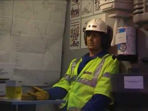 Mannequin in living tableau scene to demonstrate Laing O'Rourke Welfare vehicle mannequin-man performming as a Living Mannequin: Mannequin-man in static demonstration of Laing O'Rourke Welfare vehicle at Yorkshire Water Event - Discovery Zone for Laing O'Rourke on 12/11/2003
