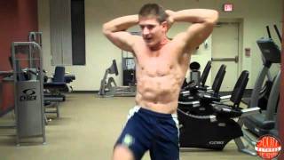 Standing Opposite Elbow-To-Knee Crunch exercise video thumbnail