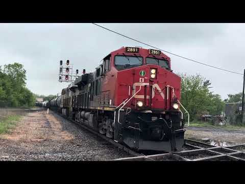 Canadian National 2851 and 3921 slam diamond fast moving East in Durand Mi