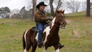 Roy Moore arrives on horseback to cast vote