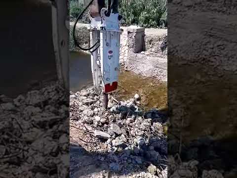 KOMAC BREAKER WORKING IN CONCRETE DEMOLITION