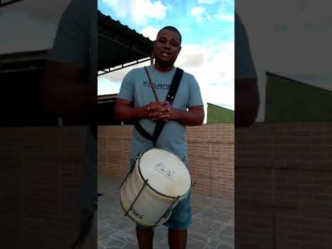 Waguinho do Repique playing a repinique with hide head for Kalango
