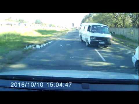 Taxis playing chicken 2016-11-28 7:00 AM Woodmead, Johannesburg (Eastern Service Road)