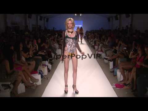 Models walk the runway during the Sauvage swimwear 2013 s...