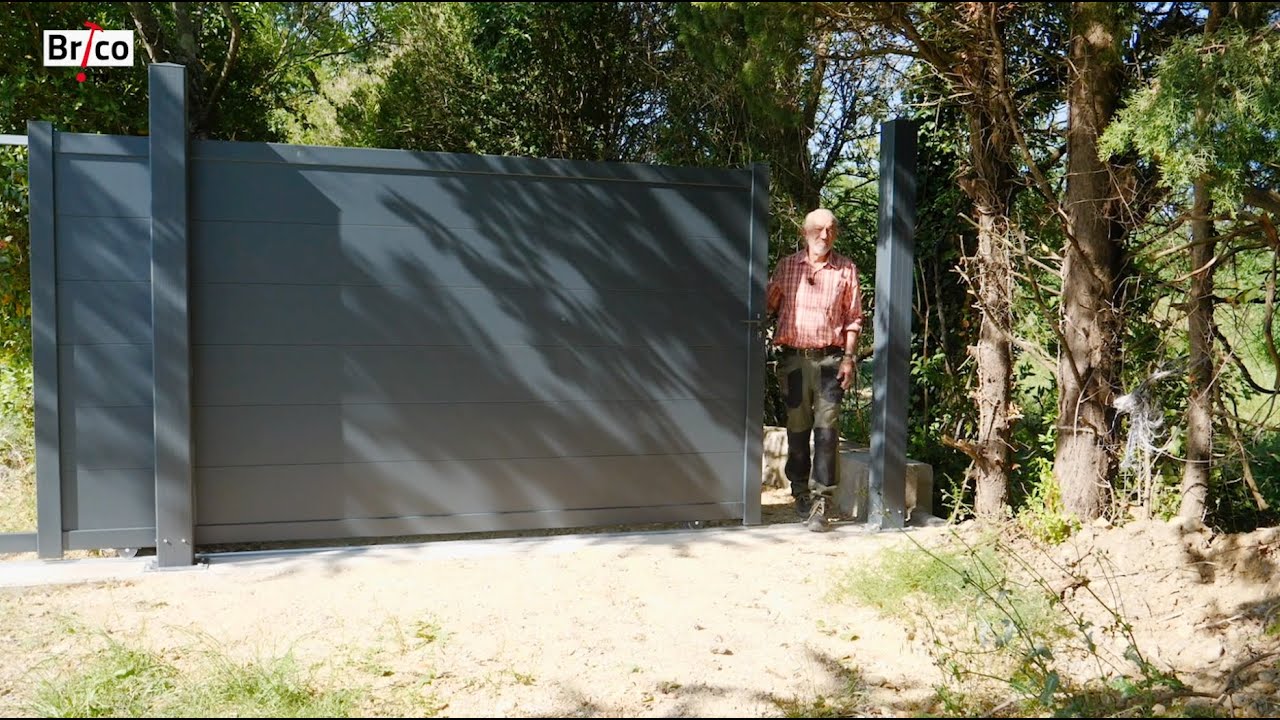 Poser un portail coulissant en alu avec 2 piliers - Tuto bricolage avec Robert