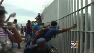 Mexico Border Gate Torn Down As Migrant Caravan Heads North Towards US