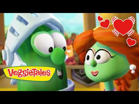 Two VeggieTales vegetables gaze at each other with a warm, loving vibe; 'VeggieTales' logo in the corner and red heart graphics overlaying the scene.