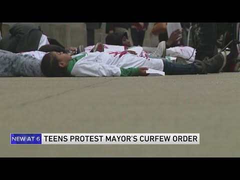 Young residents hold 'die-in' to protest proposed curfew ordinance
