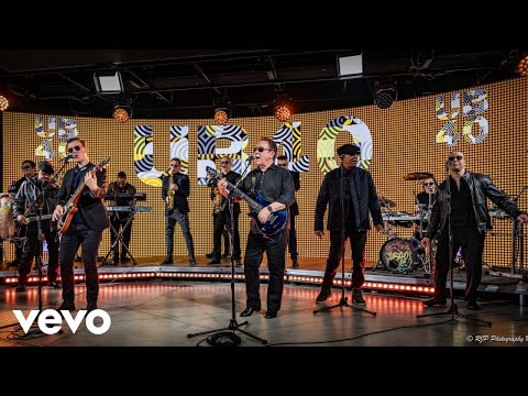 Videoclip de Gimme Some Kinda Sign — UB40