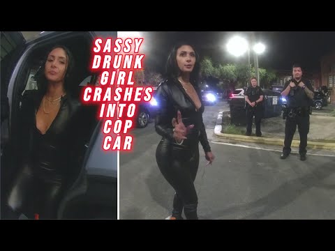 Sassy Drunk Girl Crashes Into a Cop Car and Kicks Cop During DUI Arrest
