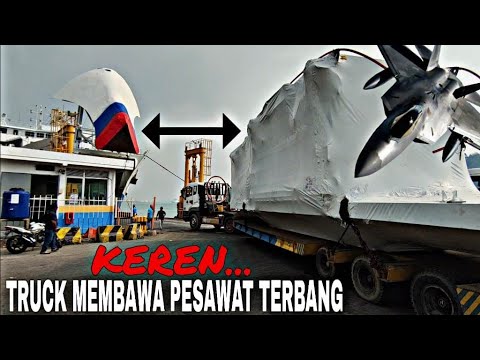 COOL❗TRUCK CARRYING PLANE ONTO SHIP AT PORT