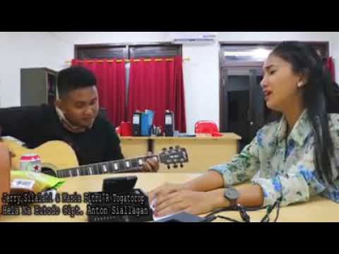 Jeffry Silalahi Ft. Maria Togatorop - Hela Na Hutodo