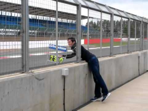 Mark Webber doubling up as Valentino Rossi's pit board man at Silverstone
