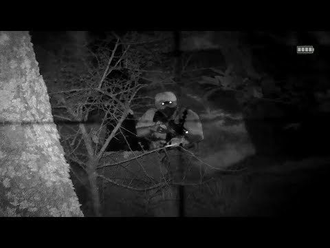MAN HUNTING with night vision device NVG and sniper rifle