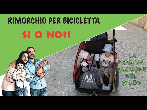 Rimorchio per bicicletta per trasportare i bambini... è comodo o no?